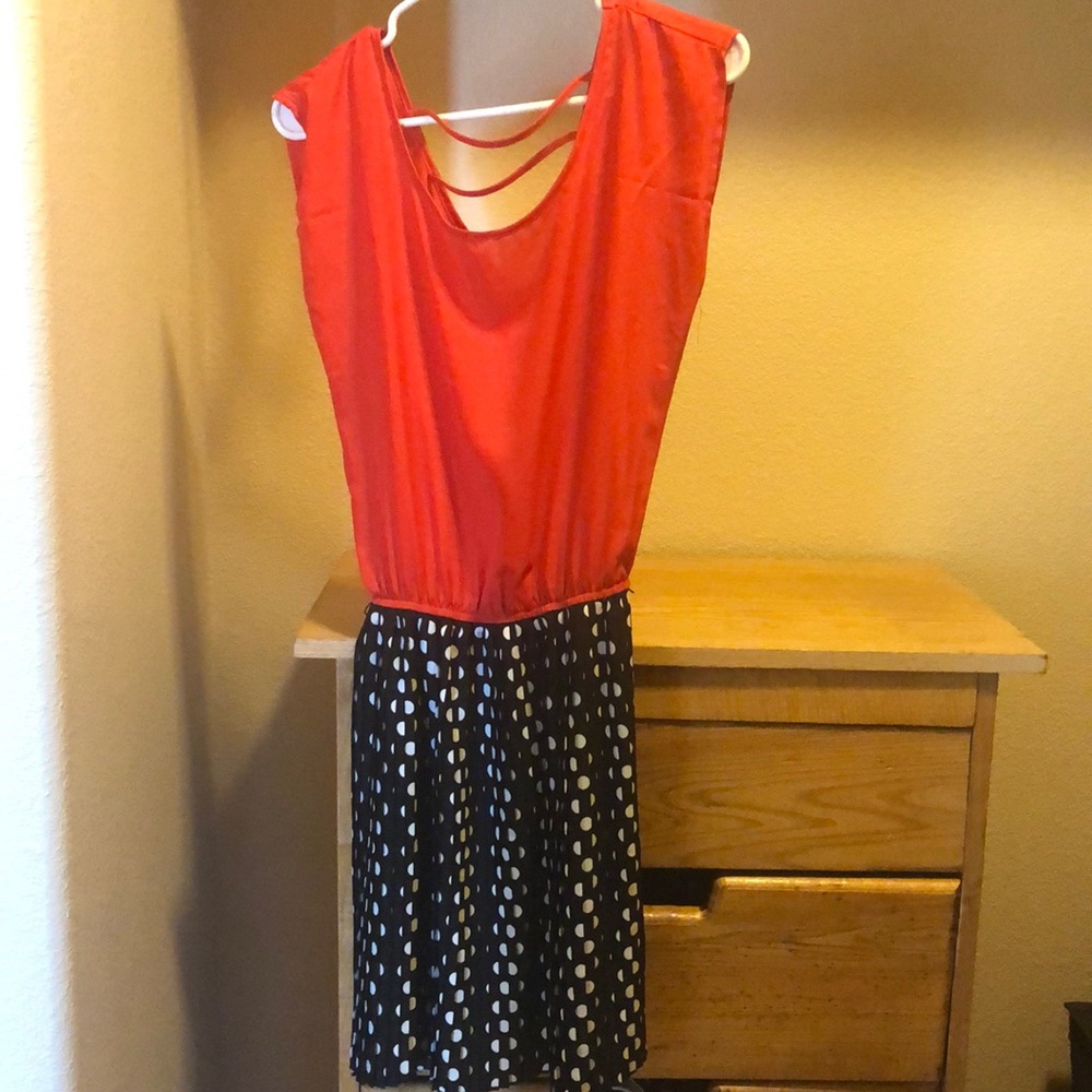 Pleated skirt black and red polka dot dress.